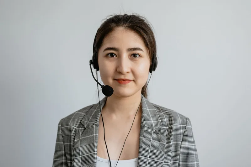 Customer service representative helping customer via mobile chat