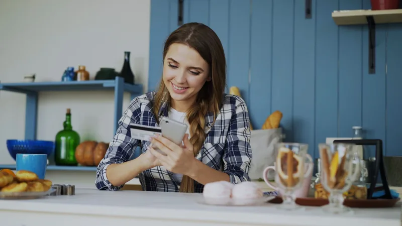 Woman reviewing her Shopee Philippines account on smartphone before requesting permanent deletion