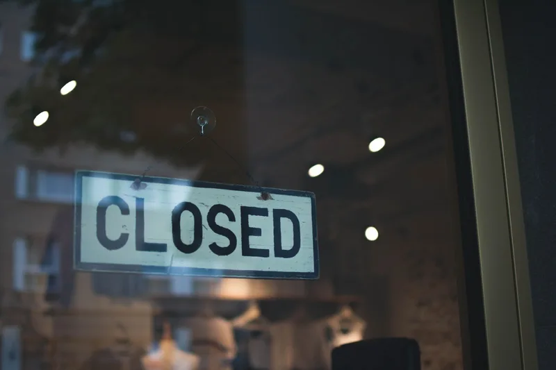 “Sorry We’re Closed” sign on a shop door, representing Vacation Mode as an alternative to permanently deleting your Shopee Philippines account